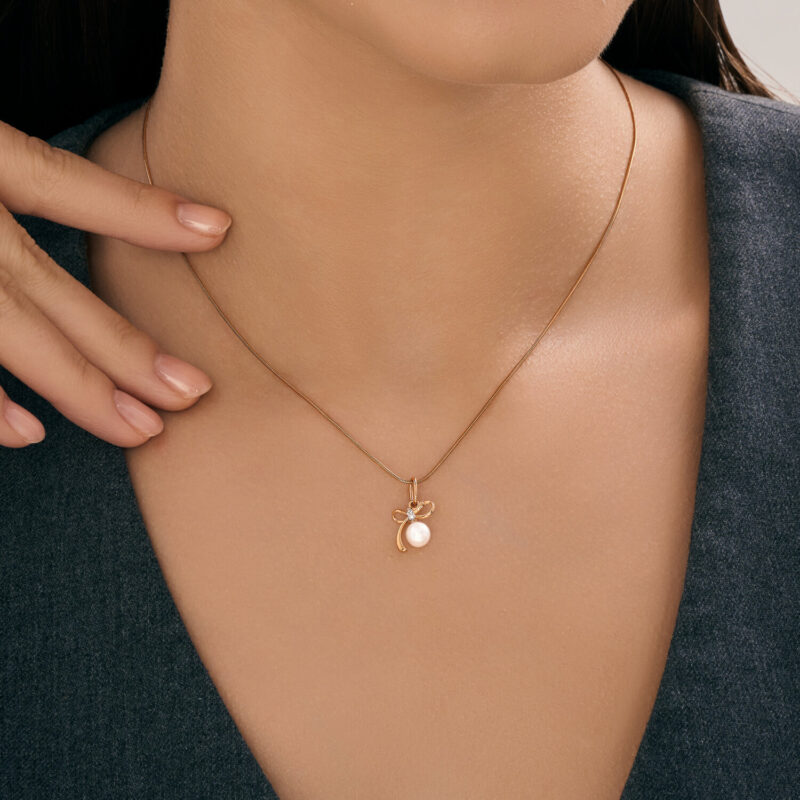 Golden Bow Pearl & Diamond Pendant - Image 3