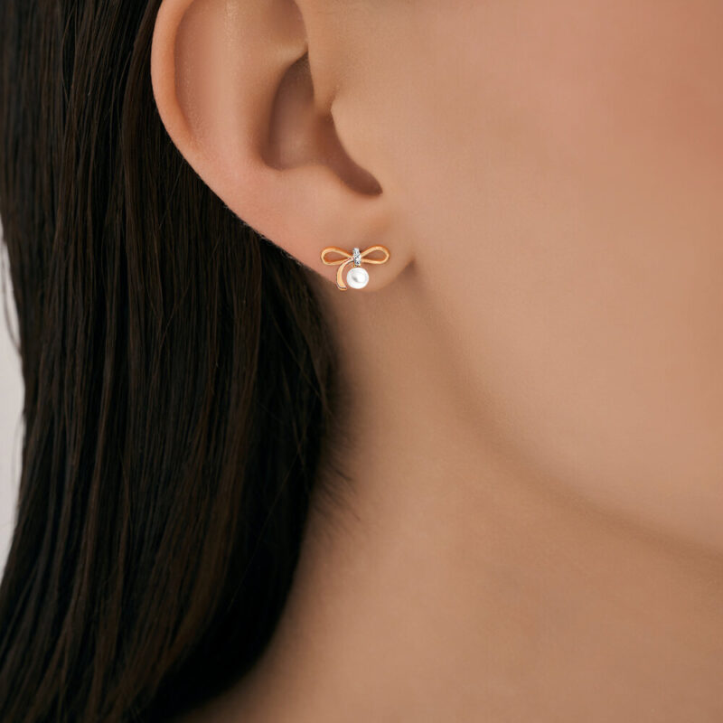 Golden Bow Pearl & Diamond Studs - Image 3